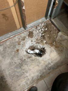 New PVC drain line repair through concrete slab by plumber in New Port Richey FL